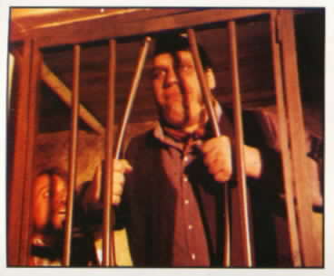 #82 Nestor bends the bars so that Enrique can escape.