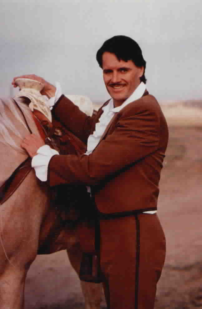 Don Diego standing next to his horse